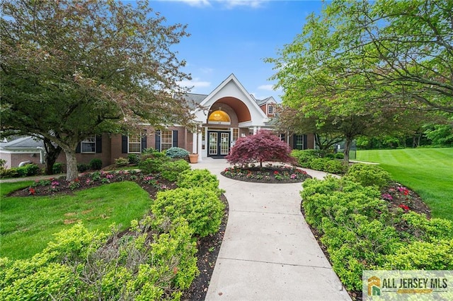 202 Canterbury Way S, Brunswick, NJ 08540 - view of front of home featuring french doors and a front yard
