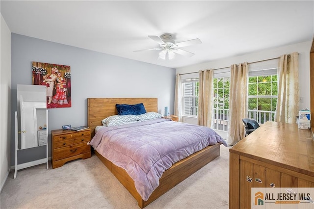 202 Canterbury Way S, Brunswick, NJ 08540 - bedroom with light colored carpet, access to outside, ceiling fan, and baseboards
