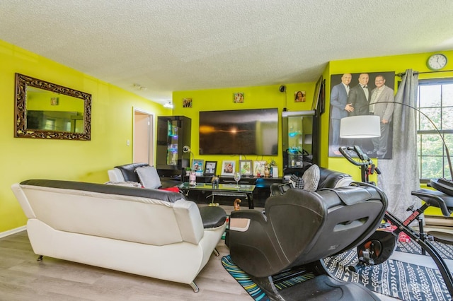 114 Griggs Pl E, Brunswick, NJ 08816 - living room featuring a textured ceiling and wood finished floors