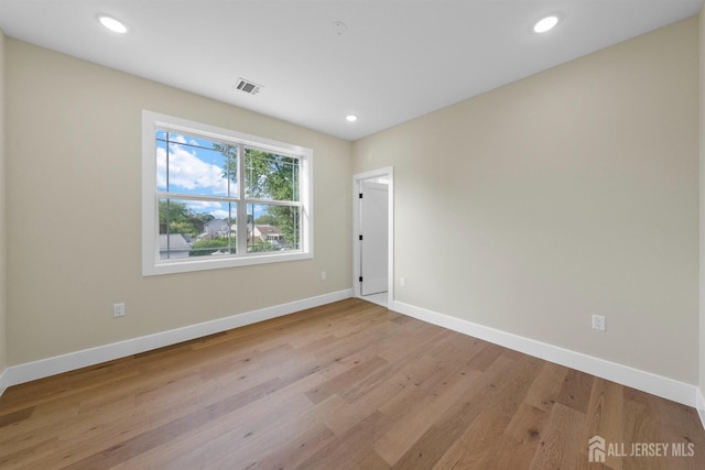 75 Jefferson Blvd, Edison, NJ 08817 - spare room featuring light wood finished floors, baseboards, and recessed lighting