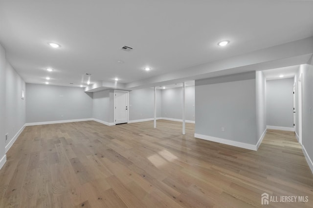75 Jefferson Blvd, Edison, NJ 08817 - finished below grade area with baseboards, light wood-type flooring, and recessed lighting