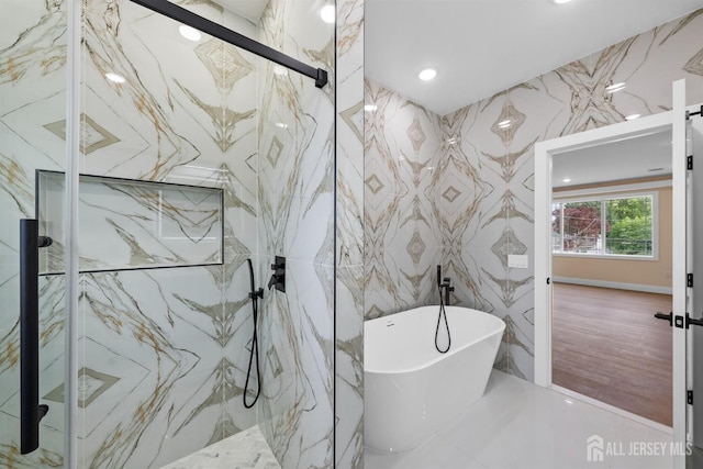 75 Jefferson Blvd, Edison, NJ 08817 - full bath with a freestanding bath, a marble finish shower, tile walls, and recessed lighting