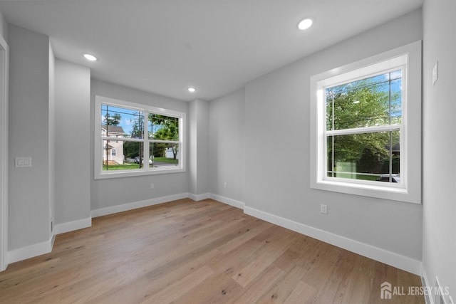 75 Jefferson Blvd, Edison, NJ 08817 - unfurnished room featuring light wood finished floors, baseboards, and recessed lighting