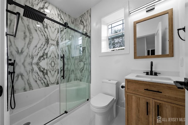 75 Jefferson Blvd, Edison, NJ 08817 - full bathroom featuring vanity, toilet, and a marble finish shower