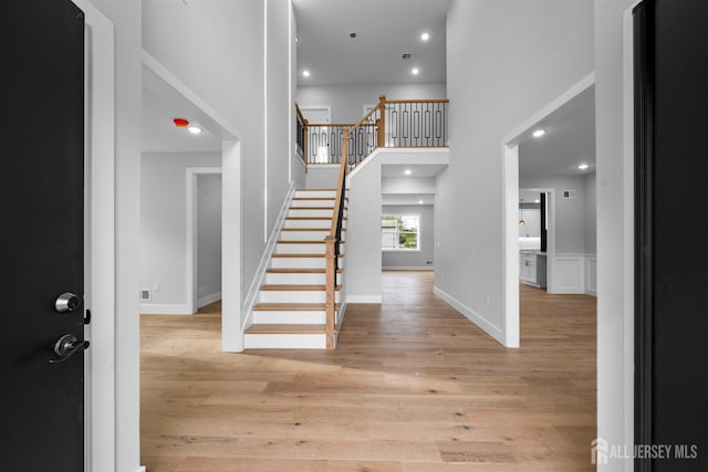 75 Jefferson Blvd, Edison, NJ 08817 - entryway with stairway, light wood-type flooring, recessed lighting, and a high ceiling