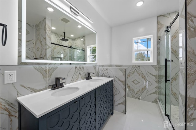 75 Jefferson Blvd, Edison, NJ 08817 - full bathroom with plenty of natural light, a marble finish shower, double vanity, tile walls, and recessed lighting