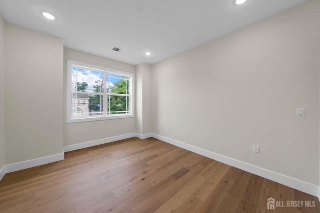 75 Jefferson Blvd, Edison, NJ 08817 - empty room with baseboards, wood finished floors, and recessed lighting