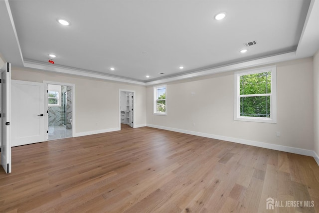 75 Jefferson Blvd, Edison, NJ 08817 - spare room with a tray ceiling, light wood finished floors, baseboards, and recessed lighting
