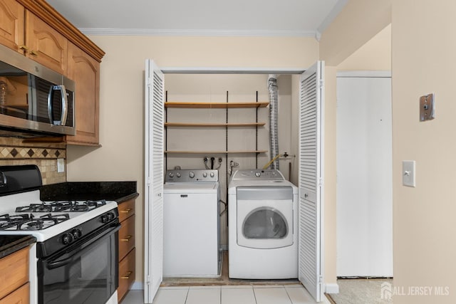 1004 Cricket Ln, Woodbridge Proper, NJ 07095 - laundry room with separate washer and dryer and crown molding