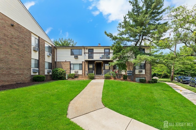 1004 Cricket Ln, Woodbridge Proper, NJ 07095 - view of front of home with a front lawn and brick siding