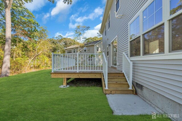 view of yard with a deck