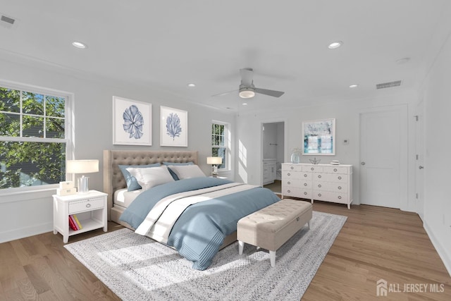 bedroom featuring hardwood / wood-style floors and ceiling fan