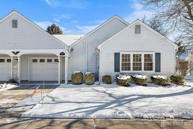 view of front of home with a garage