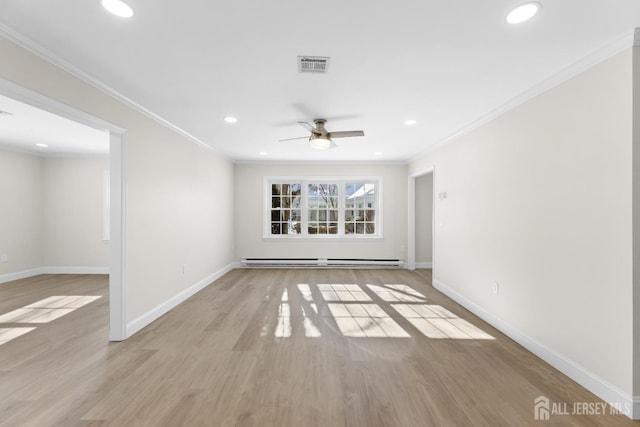 unfurnished room featuring a baseboard radiator, visible vents, baseboards, light wood-type flooring, and crown molding