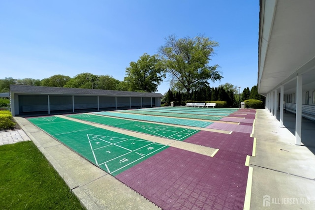 view of community with shuffleboard