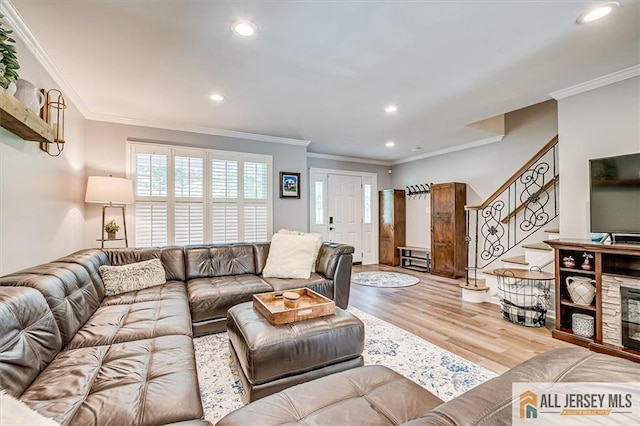 22 Kentnor St, Metuchen, NJ 08840 - living area with light wood-type flooring, stairs, recessed lighting, and ornamental molding