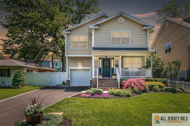 22 Kentnor St, Metuchen, NJ 08840 - traditional home with a porch, driveway, and an attached garage