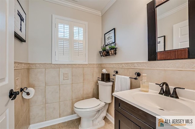 22 Kentnor St, Metuchen, NJ 08840 - half bath with ornamental molding, toilet, vanity, tile walls, and tile patterned floors