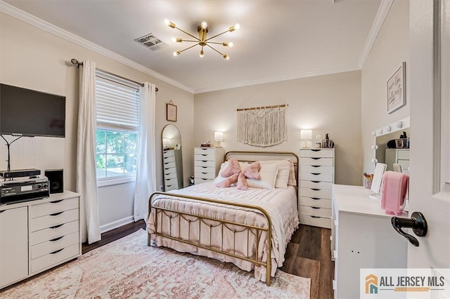 22 Kentnor St, Metuchen, NJ 08840 - bedroom with ornamental molding, a chandelier, and light wood-style flooring
