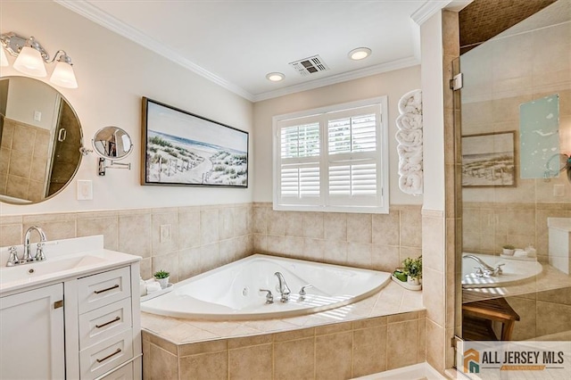 22 Kentnor St, Metuchen, NJ 08840 - bathroom featuring vanity, a whirlpool tub, crown molding, recessed lighting, and a tile shower
