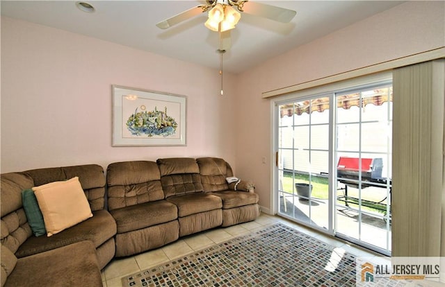 525 Harrier Dr Unit 525, Monroe, NJ 08831 - living area with light tile patterned floors, a ceiling fan, and baseboards