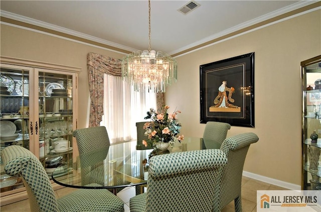 525 Harrier Dr Unit 525, Monroe, NJ 08831 - tiled dining area with a chandelier, ornamental molding, and baseboards