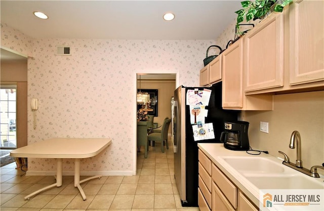 525 Harrier Dr Unit 525, Monroe, NJ 08831 - kitchen featuring light tile patterned floors, wallpapered walls, a sink, light countertops, and recessed lighting