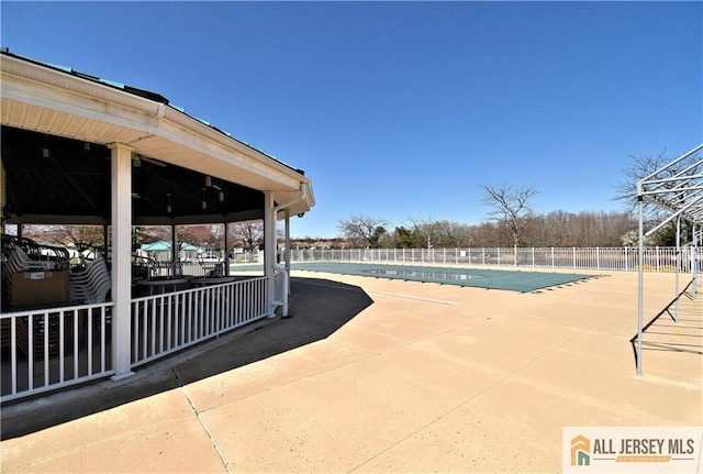 525 Harrier Dr Unit 525, Monroe, NJ 08831 - community pool featuring fence and a patio