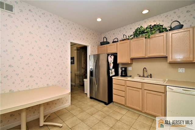525 Harrier Dr Unit 525, Monroe, NJ 08831 - kitchen featuring wallpapered walls, white dishwasher, stainless steel fridge with ice dispenser, a sink, and light brown cabinetry