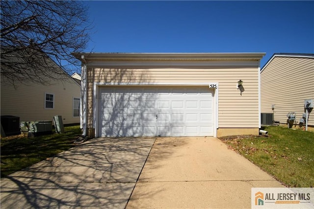 525 Harrier Dr Unit 525, Monroe, NJ 08831 - garage with central air condition unit and concrete driveway