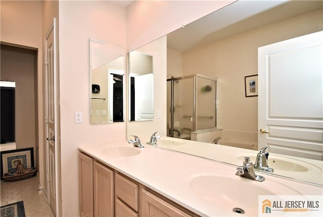 525 Harrier Dr Unit 525, Monroe, NJ 08831 - bathroom featuring a shower stall, tile patterned floors, a tub to relax in, and double vanity