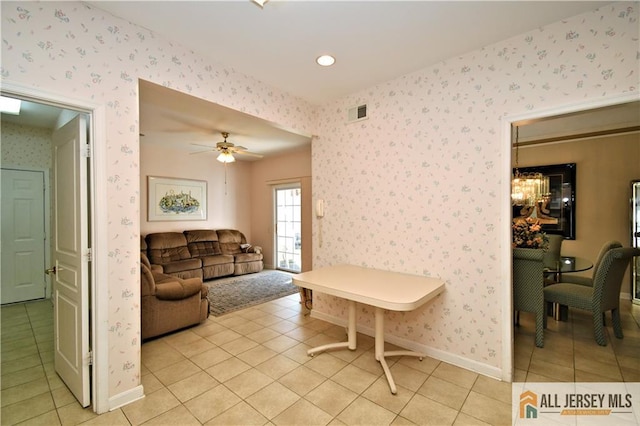525 Harrier Dr Unit 525, Monroe, NJ 08831 - living room with wallpapered walls, light tile patterned floors, a chandelier, baseboards, and ceiling fan