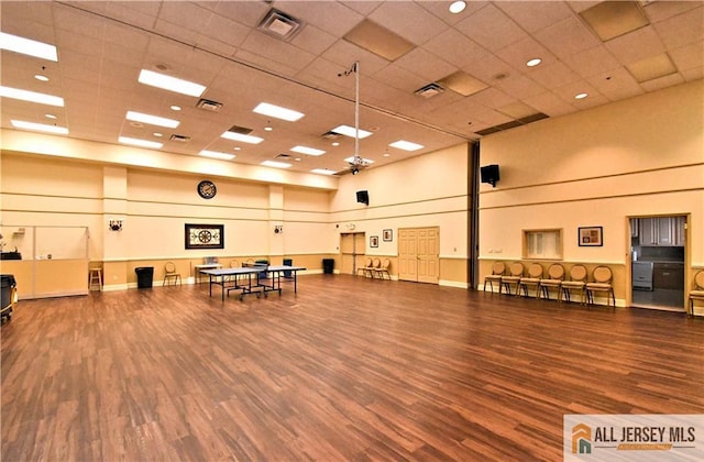 525 Harrier Dr Unit 525, Monroe, NJ 08831 - misc room with a towering ceiling, a paneled ceiling, and wood finished floors