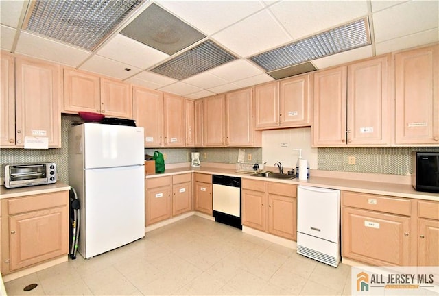 525 Harrier Dr Unit 525, Monroe, NJ 08831 - kitchen with white appliances, light brown cabinets, a sink, light countertops, and a paneled ceiling