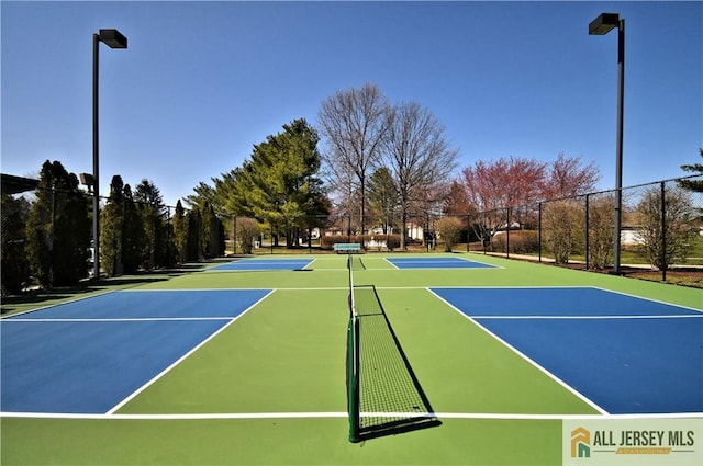 525 Harrier Dr Unit 525, Monroe, NJ 08831 - view of tennis court featuring community basketball court and fence
