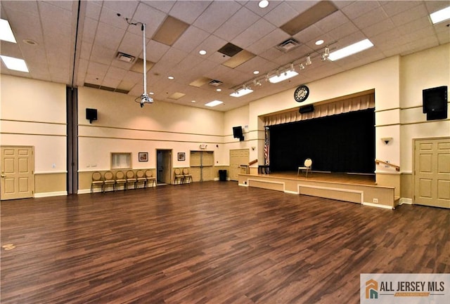 525 Harrier Dr Unit 525, Monroe, NJ 08831 - miscellaneous room with wood finished floors, a paneled ceiling, baseboards, and a towering ceiling