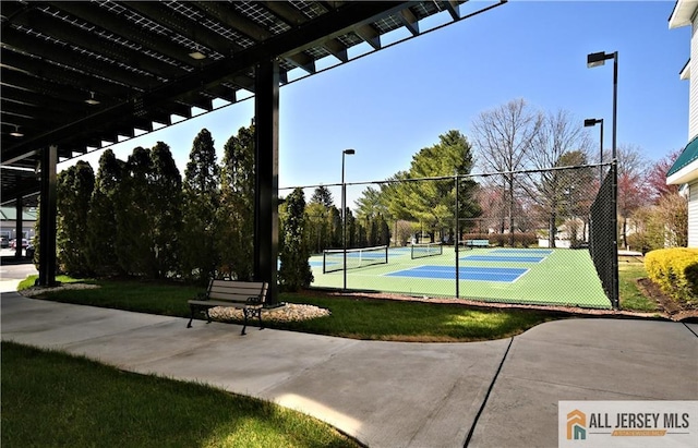525 Harrier Dr Unit 525, Monroe, NJ 08831 - view of basketball court with a tennis court and fence