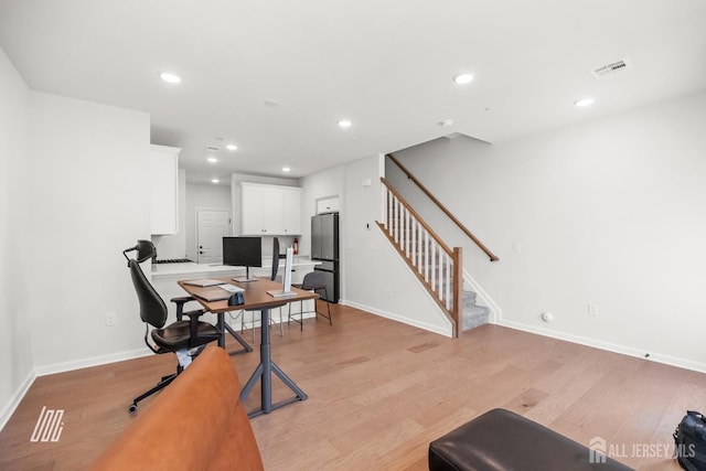 office space featuring light hardwood / wood-style flooring