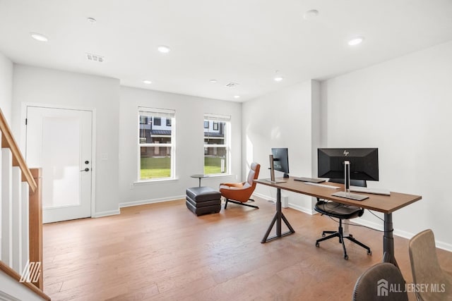 office space featuring light wood-type flooring