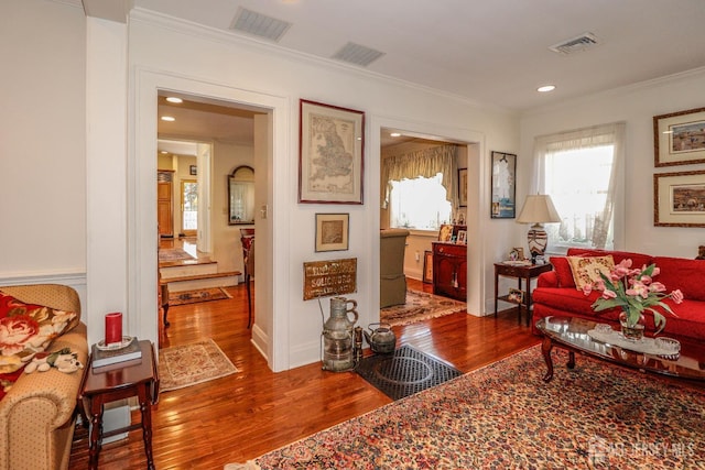 217 Midland Ave, Metuchen, NJ 08840 - living area featuring wood finished floors, crown molding, and recessed lighting