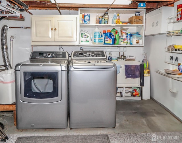 217 Midland Ave, Metuchen, NJ 08840 - laundry room featuring washing machine and dryer and cabinet space