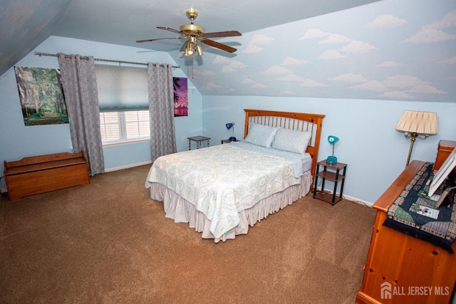 carpeted bedroom with ceiling fan and lofted ceiling