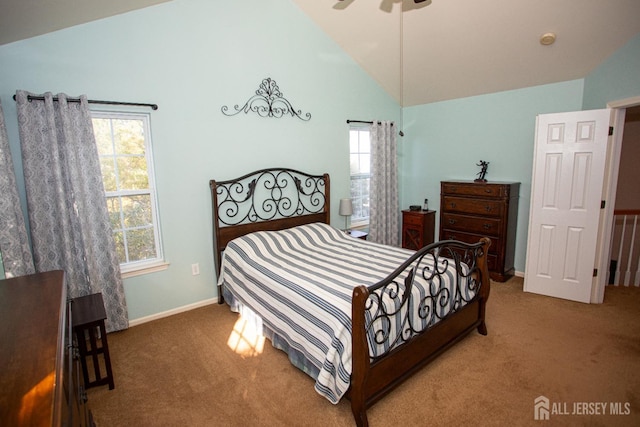 carpeted bedroom featuring ceiling fan and high vaulted ceiling