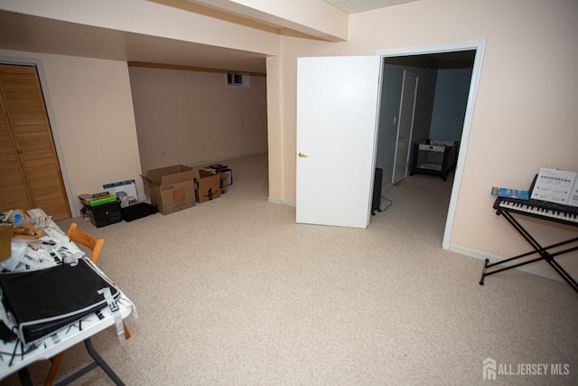 basement featuring carpet floors