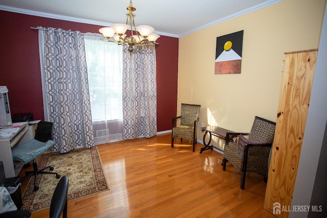 office space featuring light wood-type flooring, a chandelier, and crown molding