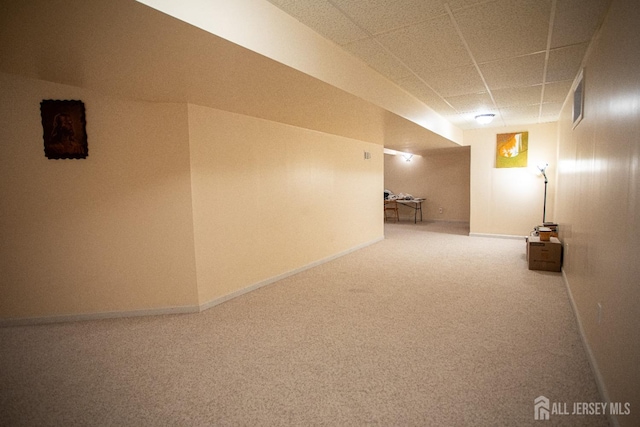 basement featuring carpet flooring