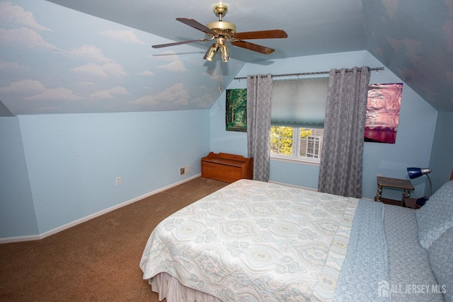 carpeted bedroom with ceiling fan and lofted ceiling