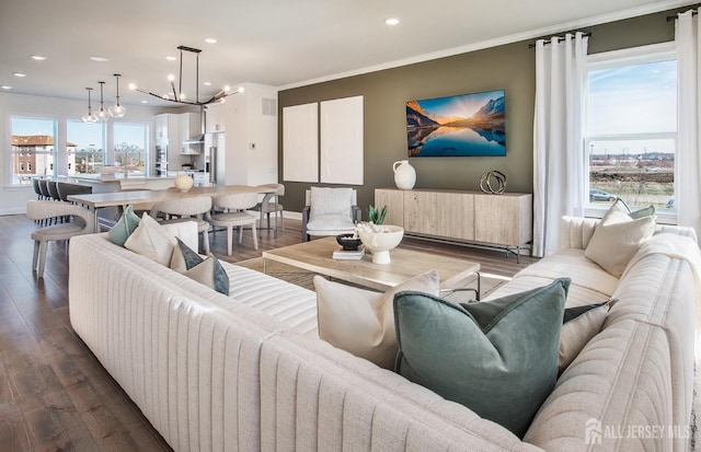 302 Nash Ave, West Windsor, NJ 08550 - living area with recessed lighting, a notable chandelier, dark wood-style floors, and radiator heating unit