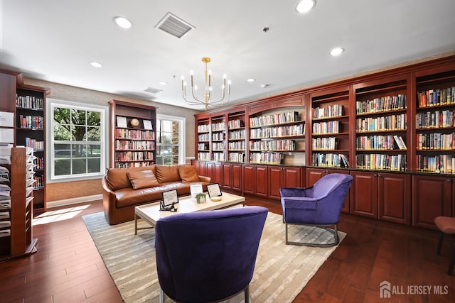 1 Jester Ct, Monroe, NJ 08831 - sitting room featuring bookshelves, a chandelier, dark wood finished floors, and recessed lighting