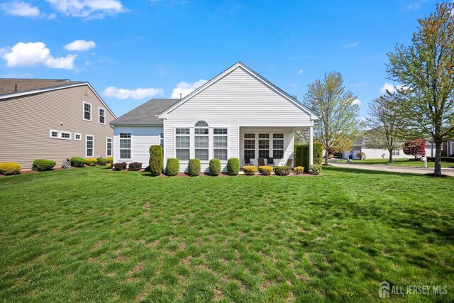 1 Jester Ct, Monroe, NJ 08831 - back of house featuring a yard